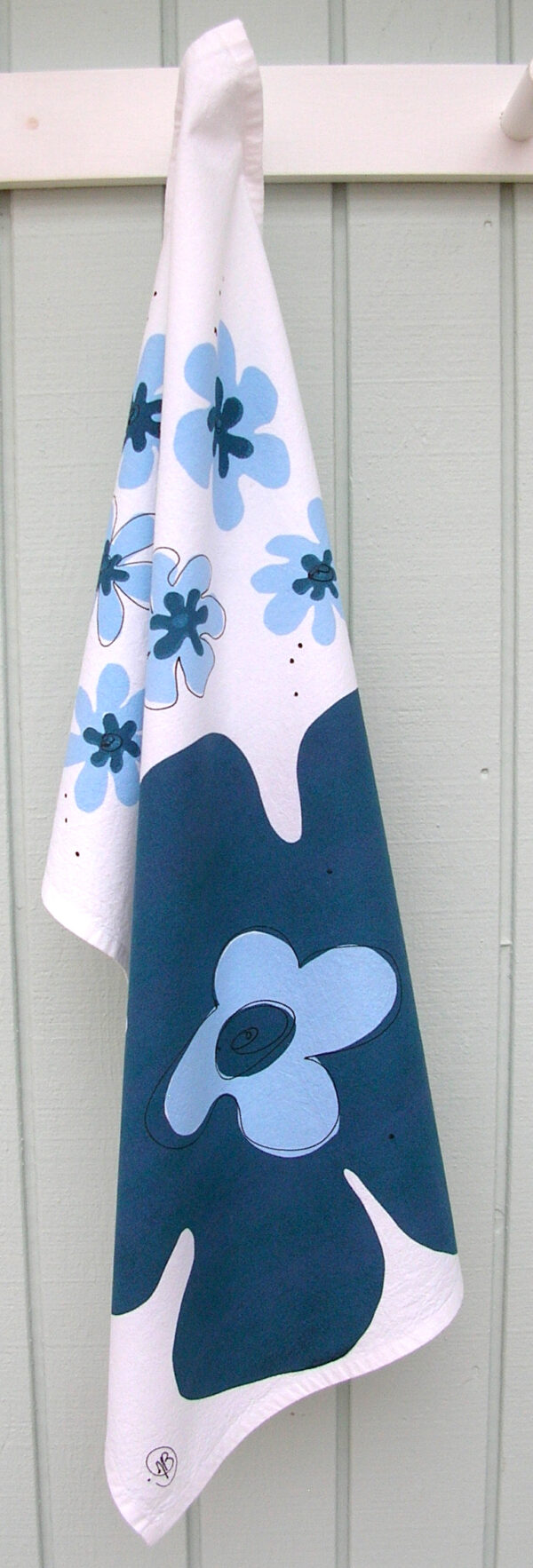 Blue Indigo tea towel on a white background.